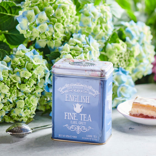 A delightful tea tin featuring a lovely English floral design. Highly collectable, this floral tea tin contains our popular loose-leaf Earl Grey tea. Earl Grey is a fragrant and aromatic light afternoon tea flavoured with bergamot. Serve black, with