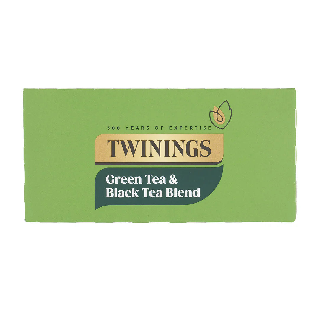Twinings green tea and black tea blend packaging on a white background, showing 300 years of expertise