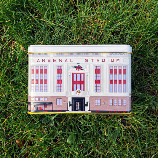 Our officially licensed Arsenal Football Club Highbury Tea Tin. A collectible tea tin celebrating Arsenal Football Club in a wonderfully artistic style. Perfect for fans and collectors, featuring a holographic emblem of authenticity. True tea-drinker