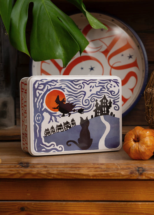 Emma Bridgewater Every savvy witch has a Halloween Medium Shallow Tin kept by her broomstick to contain all her spell-inducing essentials, such as toenail of frog, blind-worm's sting and fillet of a fenny snake.