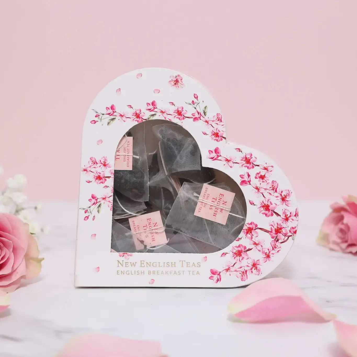 Our Heart Shaped box of premium tea pyramids makes a lovely and thoughtful gift for Valentine's Day, Mother's Day, and any other occasion for that matter! Featuring a heart shaped carton with Cherry Blossom watercolour illustrations and gold foil det