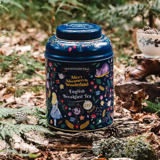 In midnight blue, this extra large, round tea tin features illustrations of the wacky and weird world of Wonderland that Alice encountered after falling down the rabbit hole. Enjoy our signature English Breakfast blend - a rich golden cup that's perf