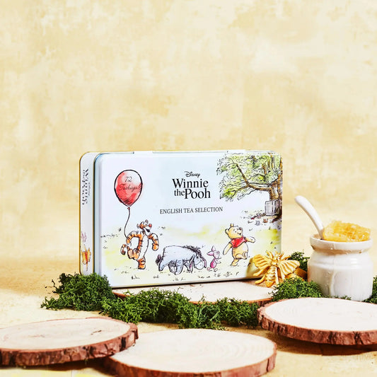 Featuring familiar scenes from Hundred Acre Wood, this charming 72-teabag selection tin contains a selection of English Breakfast, English Afternoon & Earl Grey teabags. With original illustrations and your favourite characters, this is the ideal col