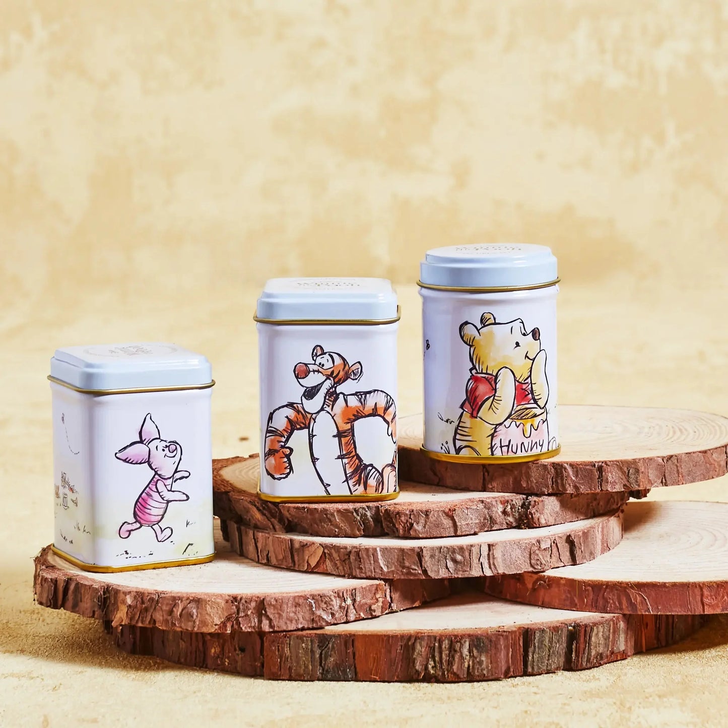 Share a cuppa with Pooh and pals with this jolly Winnie the Pooh & Friends Mini Tin Gift Set! It comes with a trio of tins in a presentation box, all with original illustrations and embossed details. Brew up a pot o' English Breakfast, English Aftern