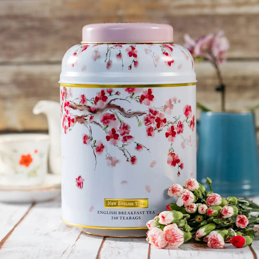 A Cherry Blossom design featuring illustrations of the ephemeral Cherry Blossom tree in flower. An elegant floral design finished with gold foil accents and embossing. This Deluxe Tea Caddy celebrates the natural beauty of the Cherry Blossom and its 