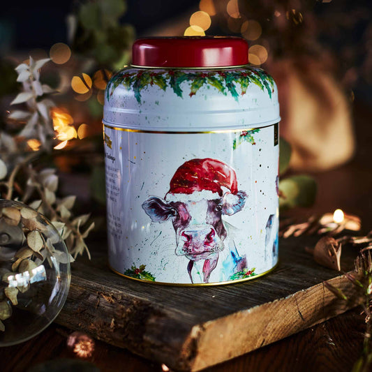 Our Christmas Cow Tea Caddy. Featuring Bluebell The Dairy Cow - A Painting by Nicola Rowles. Nicola creates animal art in her own unique style using her knowledge of different painting techniques. This beautiful illustrations were created using a mix