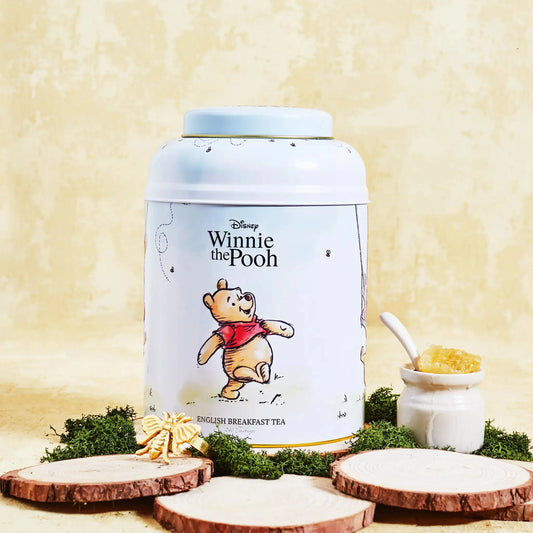 Journey into Hundred Acre Wood and imagine tea with Winnie the Pooh and Friends. Join Pooh Bear, Tigger and Piglet at tea-time with our Deluxe Tea Caddy full of 240 English Breakfast teabags. This charming tea caddy features classic character artwork