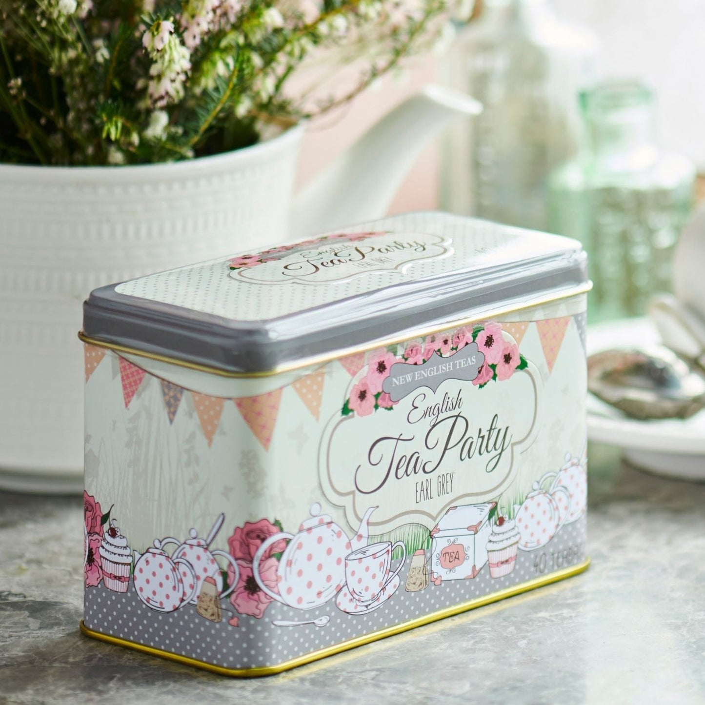 Our delightful English Tea Party Tea Tin features a vintage bunting and polka dot theme. Highly collectable, this pretty tea tin contains our popular Earl Grey teabags. Earl Grey is a light, fragrant and aromatic afternoon tea, flavoured with bergamo