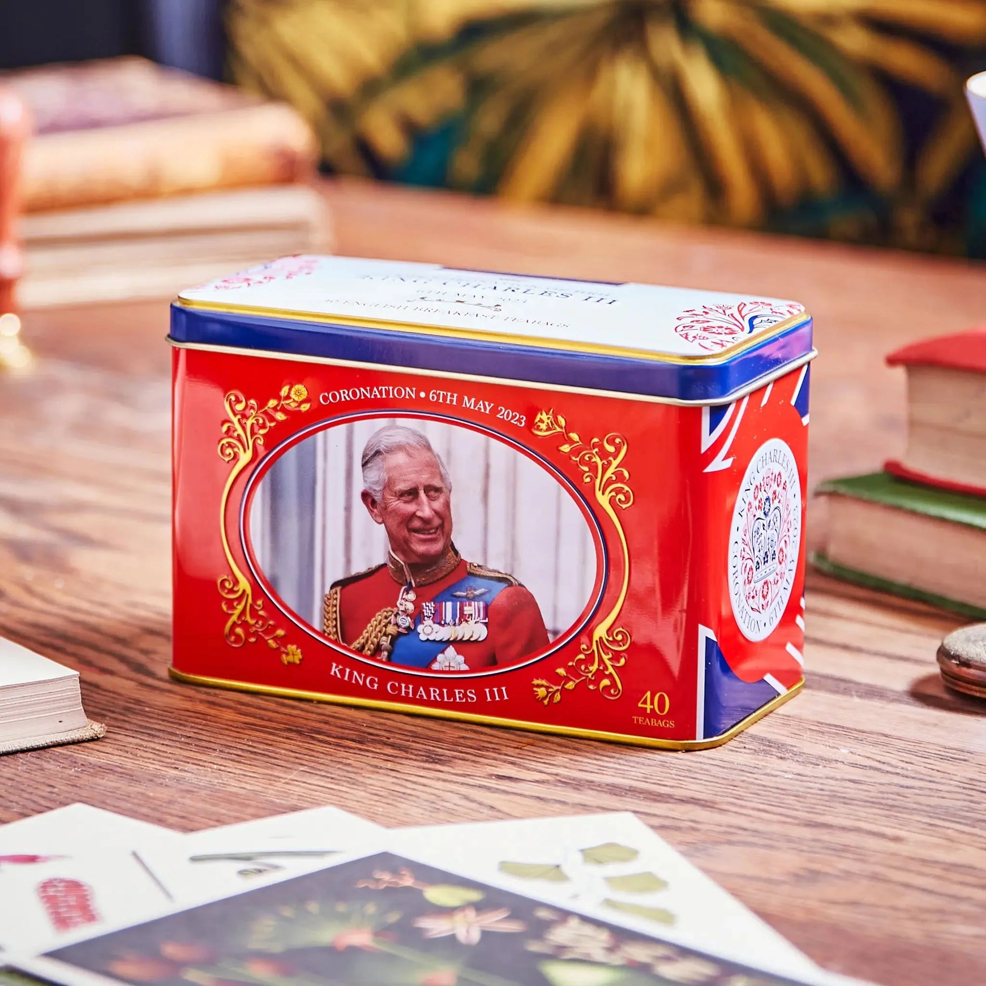 The King Charles III Tea Tin celebrates the coronation of King Charles with a luxury commemorative tea tin complete with gold foil detailing, embossing, and includes 40 of our celebrated signature English Breakfast teabags. Tea fit for royalty! Comme