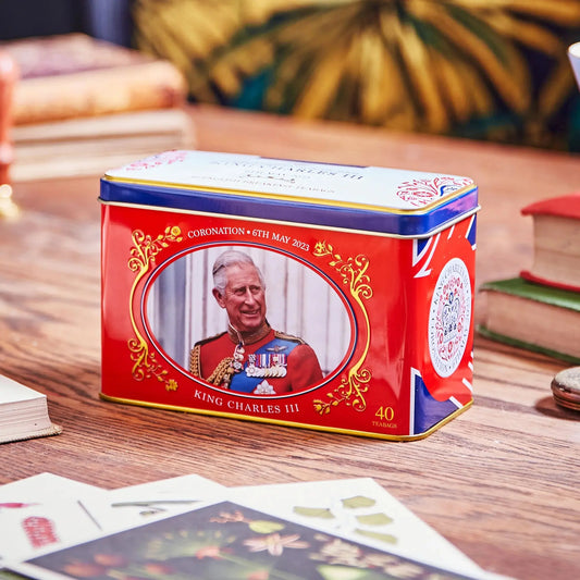 The King Charles III Tea Tin celebrates the coronation of King Charles with a luxury commemorative tea tin complete with gold foil detailing, embossing, and includes 40 of our celebrated signature English Breakfast teabags. Tea fit for royalty! Comme