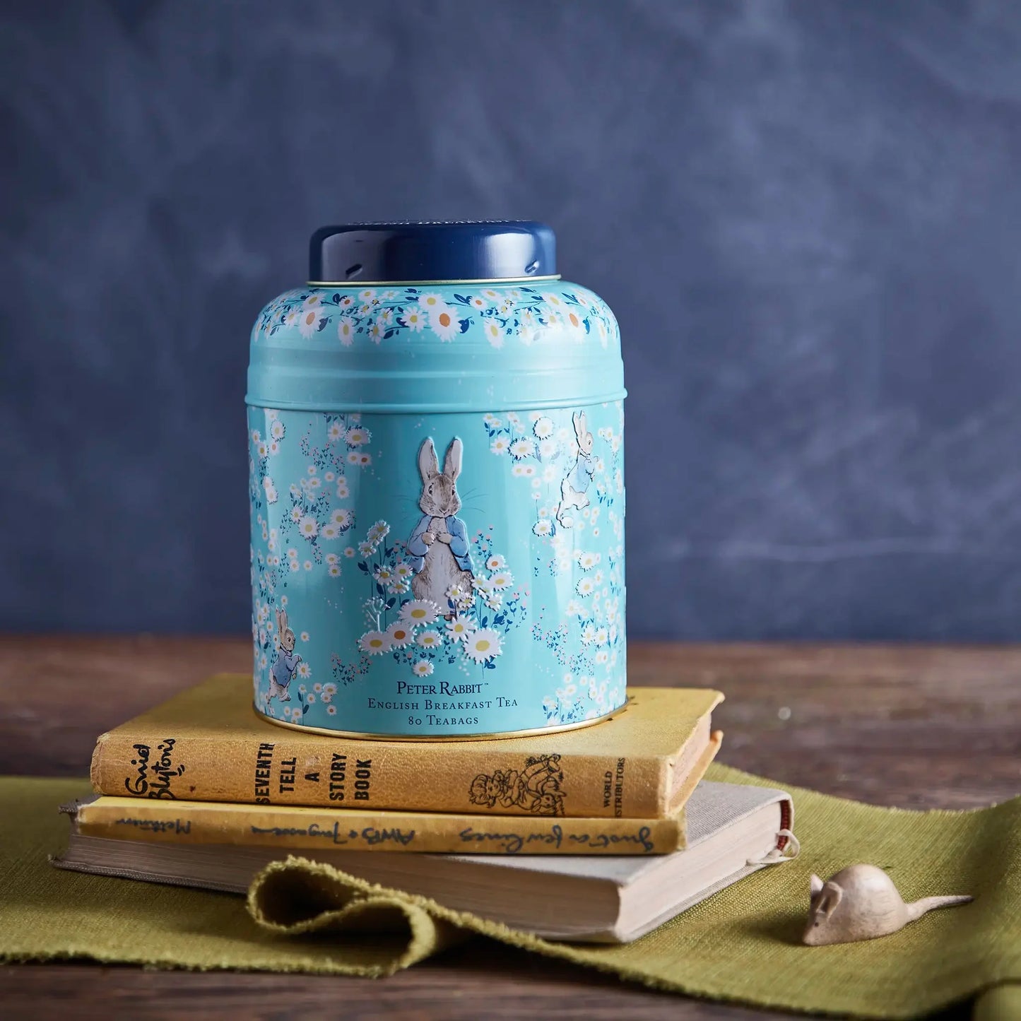 Our officially licensed Peter Rabbit Daisies Tea Caddy is very collectable and elegantly designed, featuring original illustrations on a backdrop of timeless pastel blue. This embossed tea caddy is our mid-sized offering and contains 80 of our most p