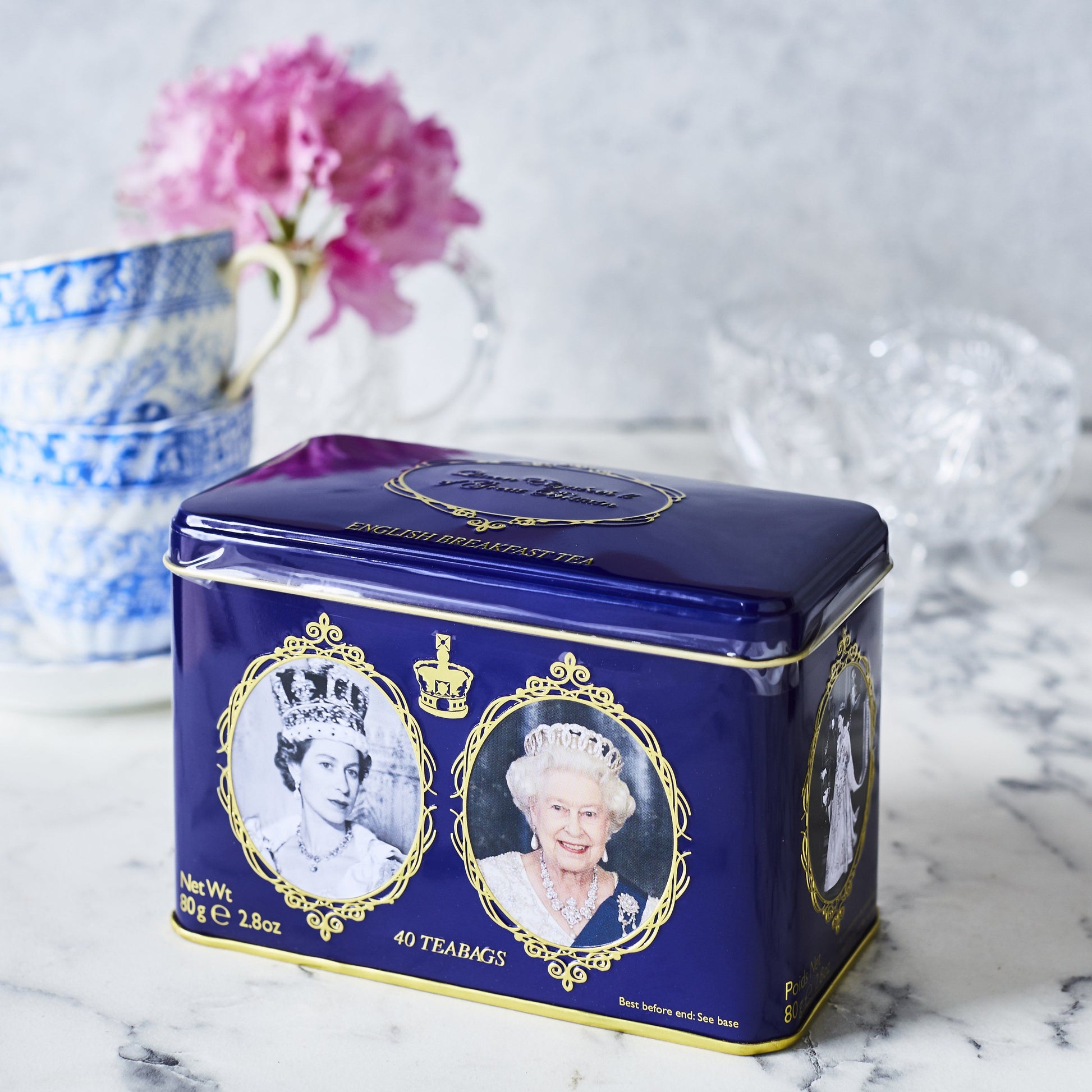 Our Queen Elizabeth II Classic Tea Tin is a bestseller from our commemorative range, and displays Her Late Royal Majesty in glorious photographs taken through the decades. A perfect memento in celebration of a glorious reign. Includes 40 of our full-