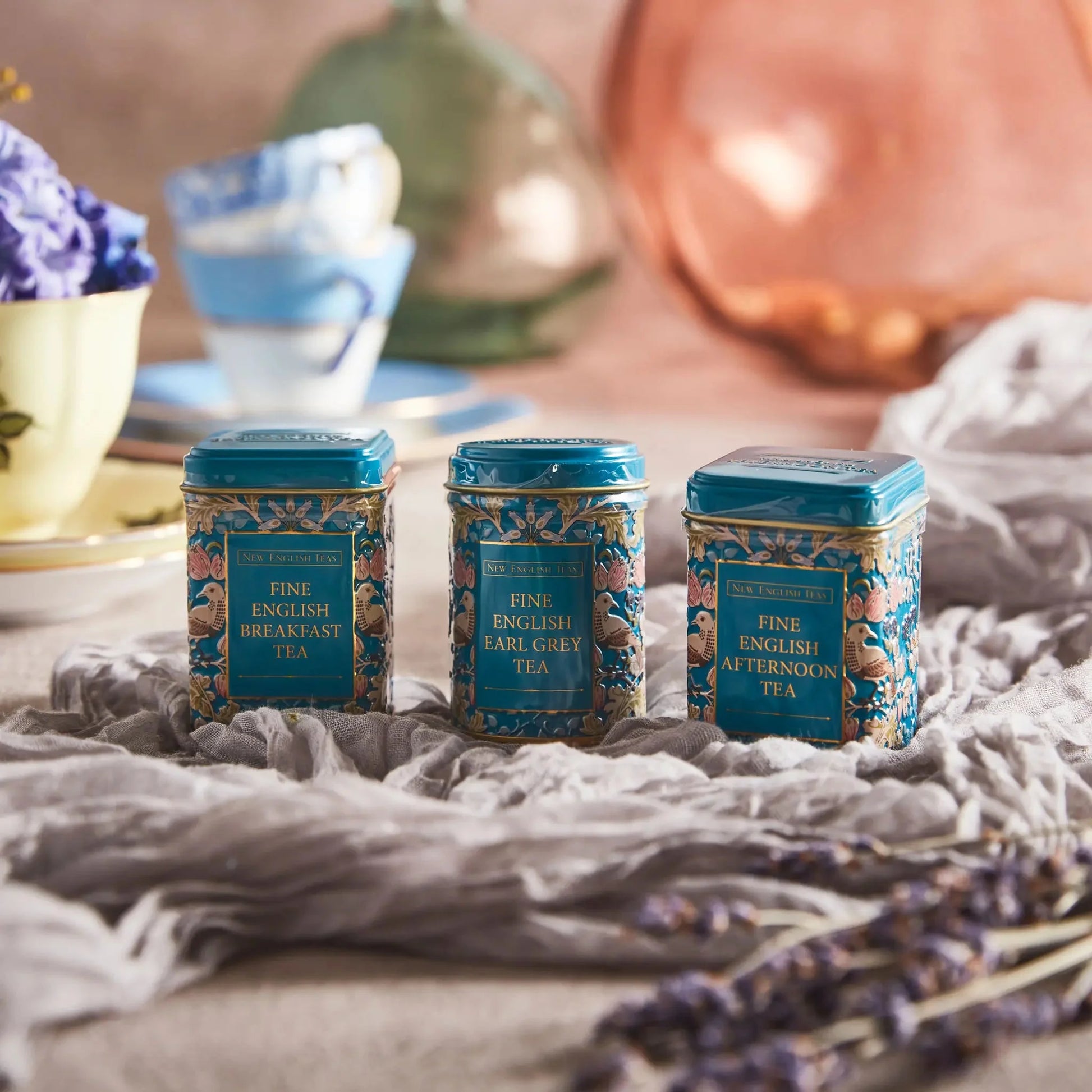 The Song Thrush Mini Tea Tin Gift Set is a beautifully curated gift set, perfect for tea lovers who want to indulge in a variety of flavors. The three mini tins come in a beautiful teal color, with a design inspired by William Morris, a prominent Eng