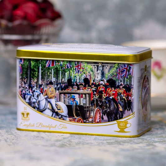 Our Trooping The Colour tea tin from our Royal Collection celebrates the ceremonial event that has become so associated with the birthday of Queen Elizabeth II. Featuring commemorative photography and gold details. Includes 40 of our signature Englis