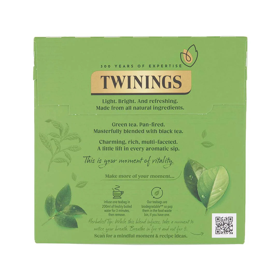 Green Twinings green tea and black tea blend tea box with text and branding on a white background