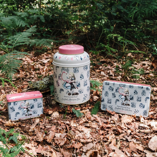 Journey to the fantastical realm of Wonderland with our Alice in Wonderland English Tea Tin Bundle. Discover three signature illustrated Alice in Wonderland tea tins, inviting you to "Drink Me!" Enjoy a whimsical symphony of flavors with this set inc