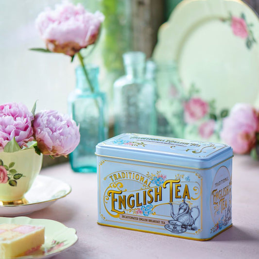 This Vintage Victorian style tea tin features a powder-blue finish, complete with Victorian era tea ware illustrations, gold trimming, embossing and azure blue Forget-Me-Not florals. Forget-Me-Nots became a symbol of love and remembrance for the Vict